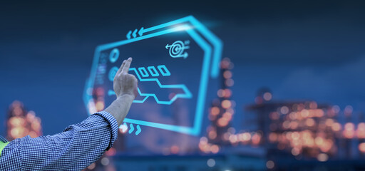 Leinwandbilder - Engineer hand arm monitoring manufacturing factory plant, manager managing controlling using computer holographic display analysis innovation technology, male engineer, banner background.