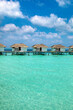 luxury water villas, Maldives beautiful scenery, landscape with turquoise water and blue sky, tourist hotel resort