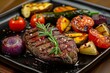 Delicious grilled fillet steak with fresh tomatoes and roast vegetables on a platter