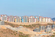 Colorful new residential buildings in Selcuk under construction against a blue sky. Izmir, Turkiye (Turkey)