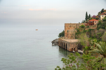 Canvas Print - Historical Alanya Shipyard and Kizil Kule walls located in Alanya district of Antalya