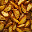 Fondo con detalle y textura de multitud de gajos de patatas al horno con aspecto delicioso