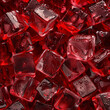 Fondo con detalle y textura de multitud de cubitos de hielo de color rojo con gotas de frescor
