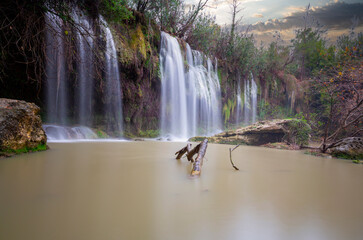 Sticker - Beautiful waterfalls over emerald water in deep green forest in Kursunlu Natural Park, Antalya, Turkey
