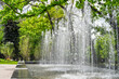 Fountains in a green spring city park