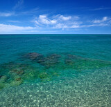 Fototapeta  - Beautiful transparent sea with blue sky