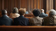 A diverse group of jurors sit in the jury box and lean forward to take in every detail of the evidence presented.