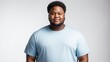 smiling young black african overweight man studio portrait on plain white background from Generative AI