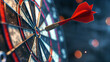 Close-up shot of a red dart hitting the bullseye on a dartboard with a blurred background.