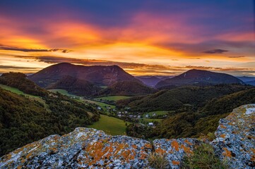 Poster - Colorful sky, fantastic evening. Picturesque and gorgeous evening scene on a rock overlooking the hills.. Beauty world.