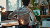 Fototapeta Abstrakcje - Office Worker Experiencing Lower Back Pain. Concept Desk Setup, Ergonomic Chair, Stretching Exercises, Posture Correction, Preventative Measures AI