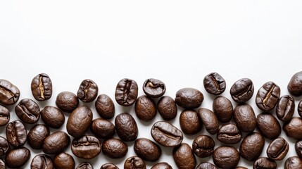   Two piles of coffee beans on separate white tables