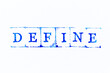 Blue color ink rubber stamp in word define on white paper background
