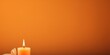 Orange background with white thin wax candle with a small lit flame for funeral grief death dead sad emotion with copy space texture for display 