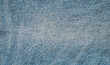 texture of light blue jeans denim fabric background
