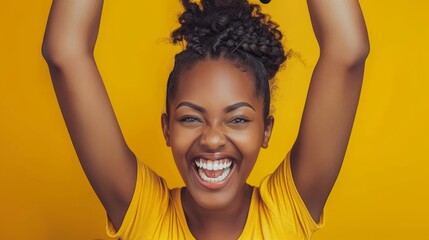 Wall Mural -   A woman in a yellow shirt raises her arms and smiles