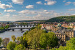 Old town of Prague. Czech Republic over river Vltava with Charles Bridge on skyline. Prague panorama landscape view with red roofs. Prague view from Letna Park, Prague, Czechia.