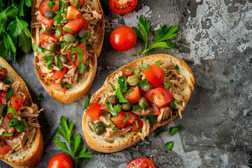 Sticker - Italian tuna bruschetta sandwiches with tomatoes and capers Top view flat lay copy space