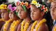 Traditional Flower Adornments. Children wearing floral headpieces and neck garlands in a cultural setting. Pasifika community