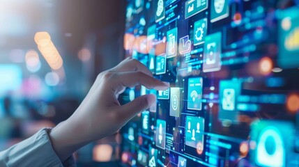 A woman is touching a computer screen with her finger