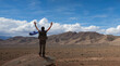 Tourist in front of the Atlas mountain range in Morocco