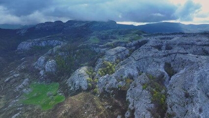Wall Mural - Aerial view from a drone of the mountain landscape and peaks of the Ason Natural Park. Soba Valley, Cantabria, Spain, Europe