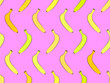 Yellow bananas on a pink background seamless pattern. Exotic sweet bananas in yellow shades. Design for wallpaper, banner printing and promotional products. Vector illustration