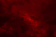 Red night sky background. Blurred photo of dark red sky. Photo can be used for the concept of Halloween and galaxy space background.	