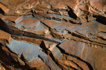 blue patterns and structures on layers of banded ironstone formations in karijini national park, in 