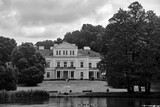 Fototapeta  - pond, park and palace in classicist style in Zloty Potok