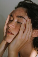 Poster - Detailed close-up of a person's face with freckles. Suitable for beauty and skincare concepts