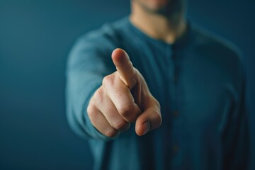 Poster - A man in a blue shirt pointing at the camera. Perfect for business presentations