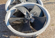 Axial metal air fan cooling propeller outside on the ground