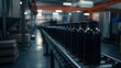 © Anastasija - Dark glass bottles moving on automated filling line
