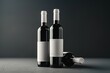 Three wine bottles with white labels on a table