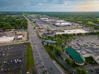 Wall Mural - An overhead perspective showcases Fayette Mall located on Nicholasville Road in Lexington, Kentucky, with its adjacent parking lots. The Lexington Green shopping complex dominates the foreground.