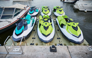 Jet ski rental business in a marina. Concept of water sports and activities to enjoy on vacation.