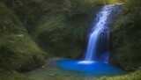Fototapeta Las - A tranquil waterfall flowing through a valley of s upscaled 2