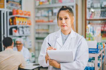 female pharmacist poses confidently welcoming, advising patients and prescription patients in a modern pharmacy.