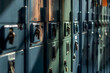 A focused shot on the locks and handles of a row of school lockers, emphasizing security and privacy