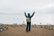Woman tourist travel Lake Inawashiro in winter, Traveler sightseeing Ducks, Swan and bird in Fukushima Prefecture, Tohoku Region, Japan. Landmark travel and adventure vacation concept