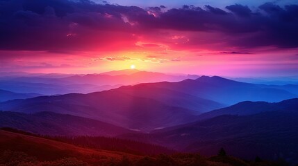 Wall Mural -   The sun is setting over the mountains, painting the sky with blue and pink hues