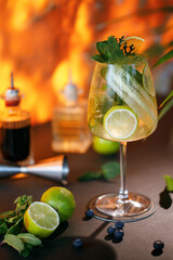 Wall Mural - a glass of liquid with lemons and mint