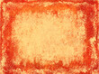 Bright colorful stains of red and yellow colors on retro paper texture. Splatter pattern on paper background. Horizontal or vertical backdrop with smeared paint