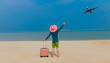 Happy moment of young man tourist  the luggage on the beach- summer travel concept