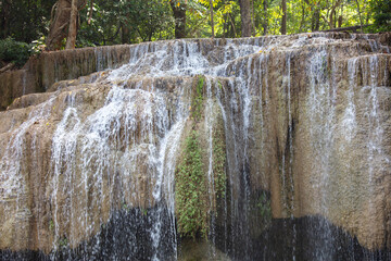 Sticker - Waterfall along a tropical river in Thailand