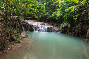 Sticker - Waterfall along a tropical river in Thailand