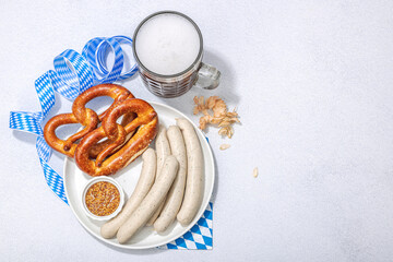 Wall Mural - Traditional Oktoberfest set. Pretzels, beer, weisswurst with mustard. German festival food concept