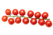 Cherry tomatoes on a branch on a white background.