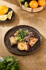 Poster - Freshly Prepared Eggplant Snack with Tomatoes and Cheese on Rustic Wooden Table, Garnished with Herbs